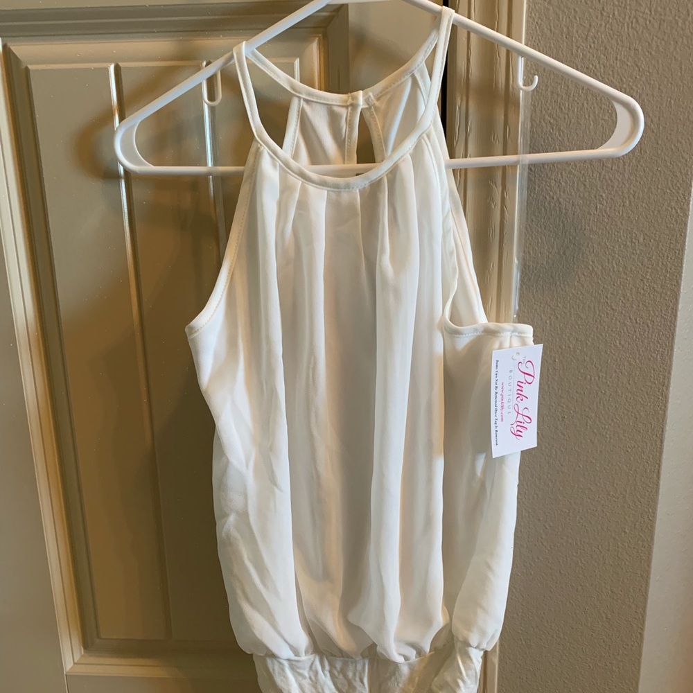 White/cream-ish bodysuit. New/tags. SM
